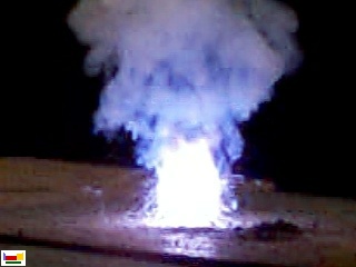 The picture shows the colour arising from a burning mixture of potassium chlorate and sucrose.